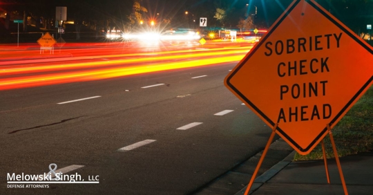 driver's perspective in car in the rain on a highway